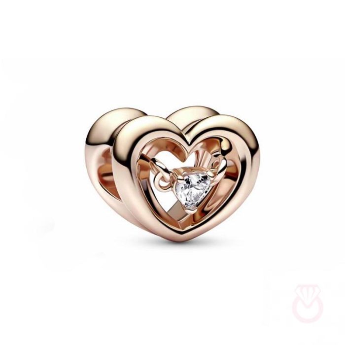 PANDORA Charm con un recubrimiento en oro rosa de 14k  Corazón Radiante & Gema Flotante  mujer amarillo  782493C01